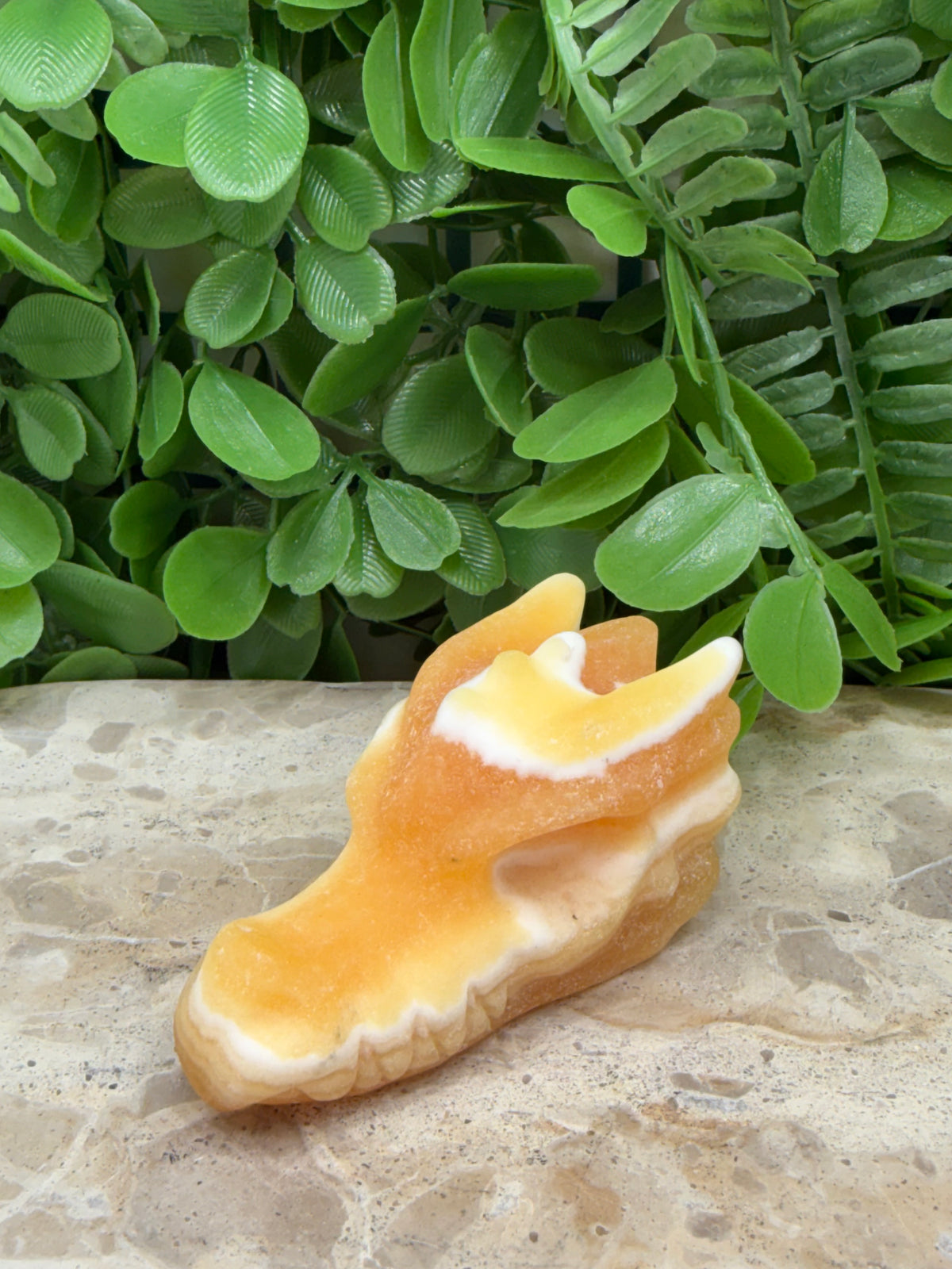 Orange Calcite Dragon Skull 130g