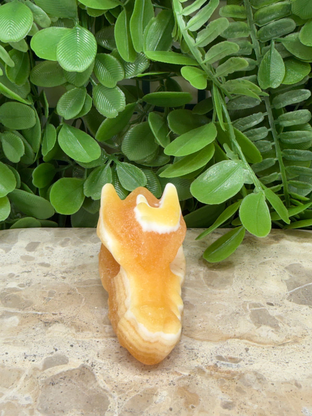 Orange Calcite Dragon Skull 130g